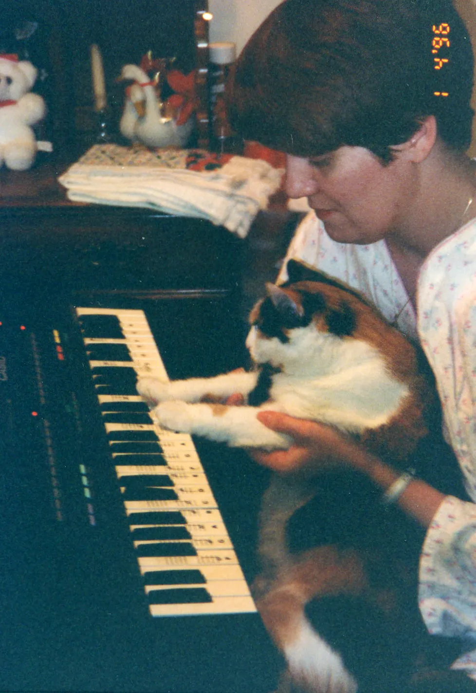 Patti and her Calico playing piano